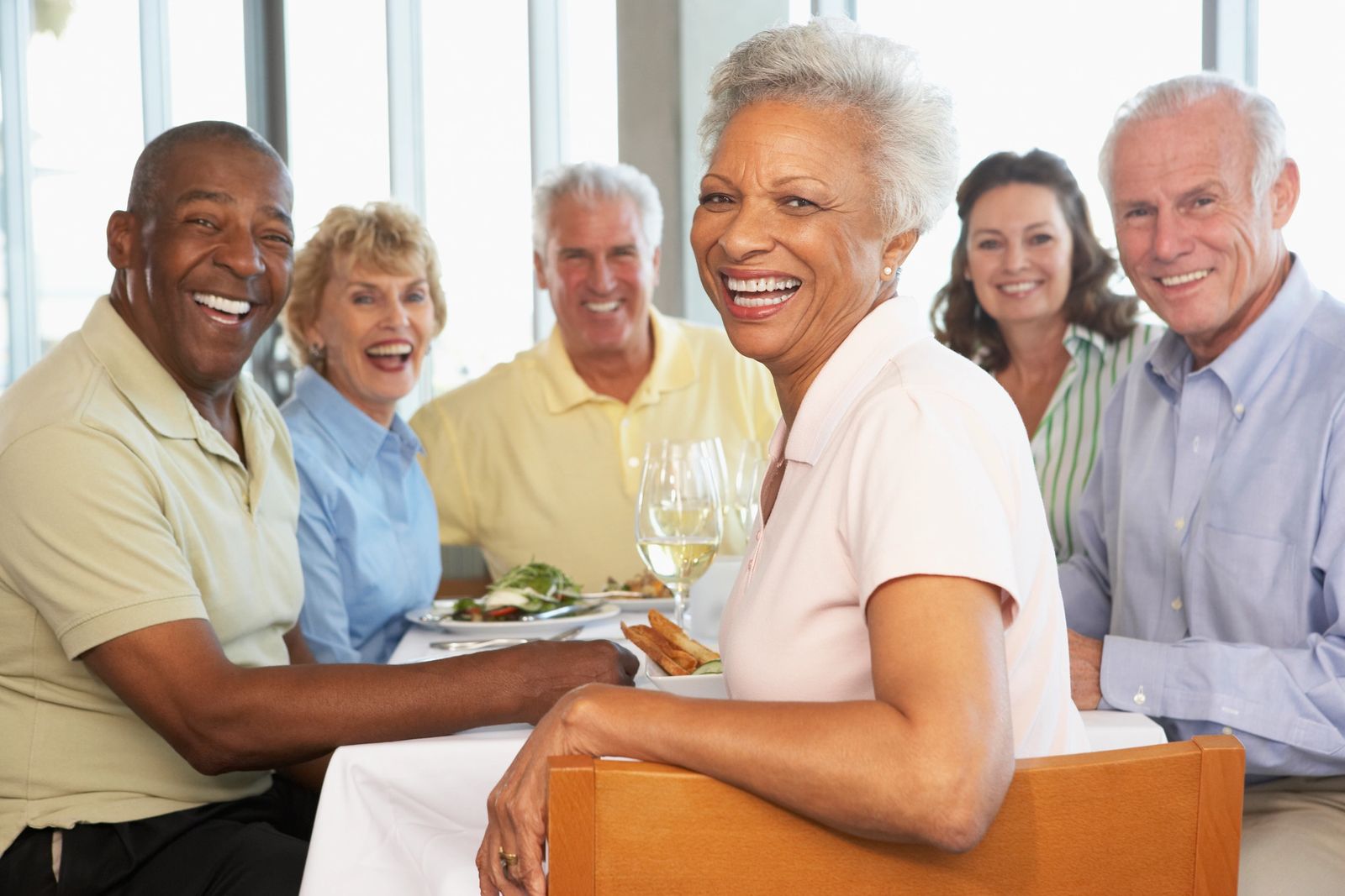 Seniors sharing a meal together